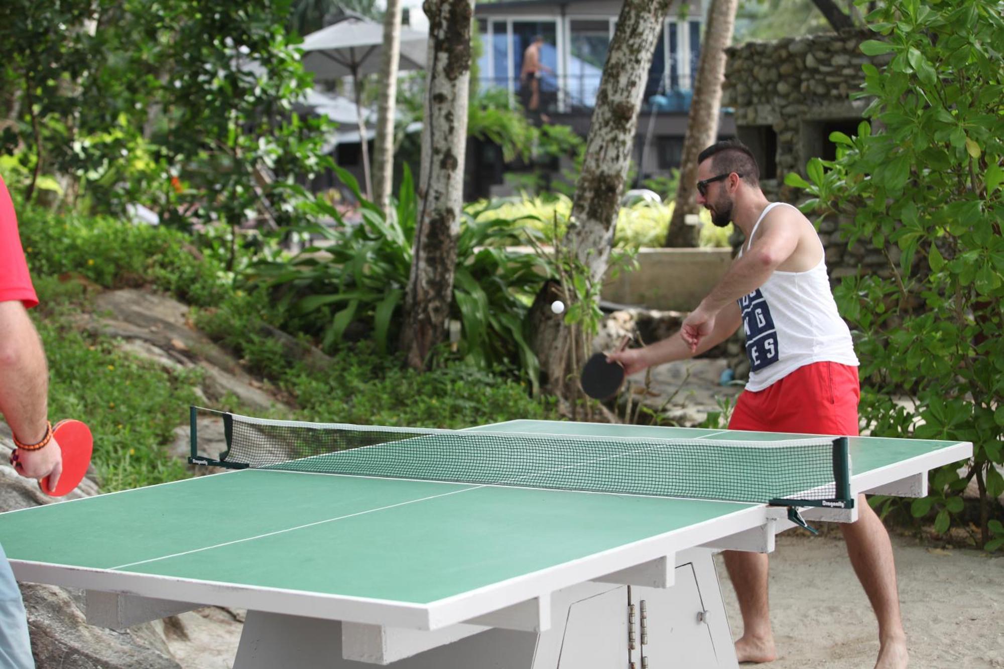 Moracea By Khao Lak Resort Ngoại thất bức ảnh A table tennis player